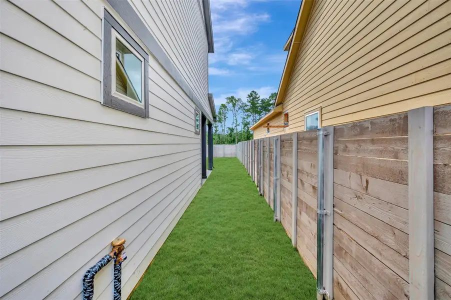 Exterior details and patio area of a home in Two Step Farm - Landmark Row Collection, Montgomery (Image 3).