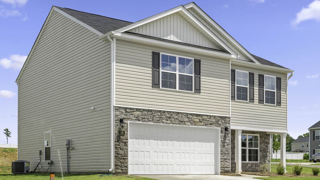 Front exterior of a new home in Raven Ridge, Lexington, NC, highlighting curb appeal (Image 16).