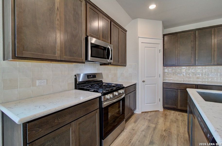 Furnished interior view inside a new home in Prairie Green, Converse (Image 6).
