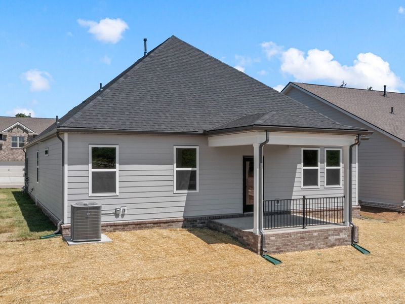 Exterior details and patio area of a home in Woods Crossing, Gallatin (Image 28).