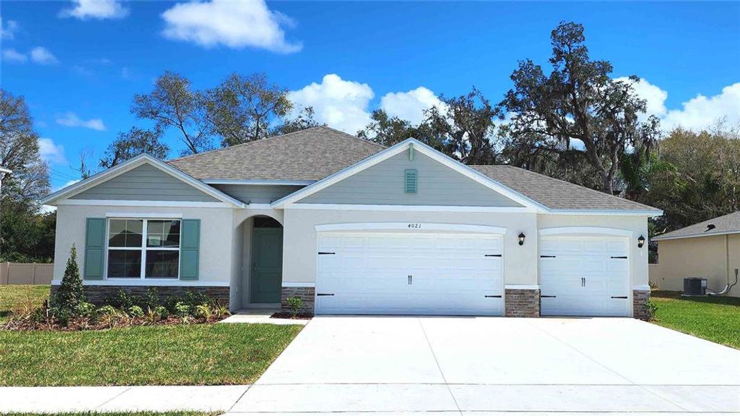 Front exterior of a new home in Bradbury Estates, Sanford, FL, highlighting curb appeal (Image 1). Front exterior of a new home in Bradbury Estates, Sanford, FL, highlighting curb appeal (Image 1).