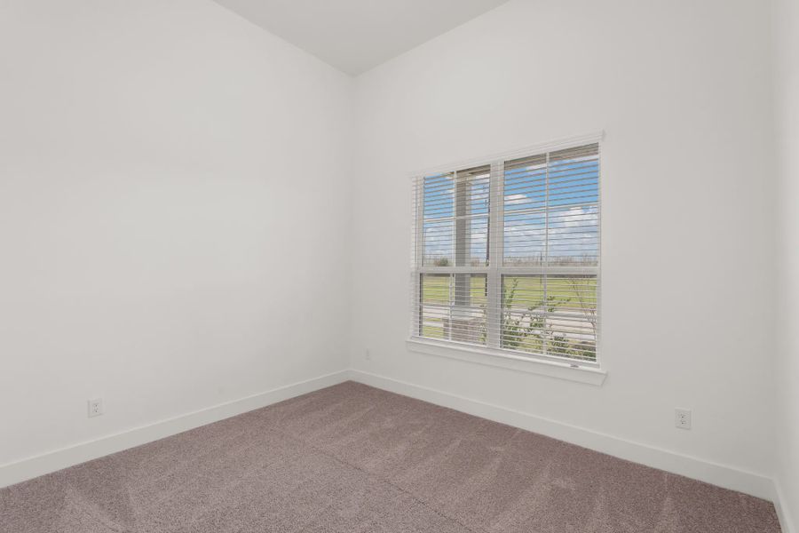Representative unfurnished interior of a home built from the Palmer by Chesmar Homes in Riceland Alley Loads, Mont Belvieu (Image 33).