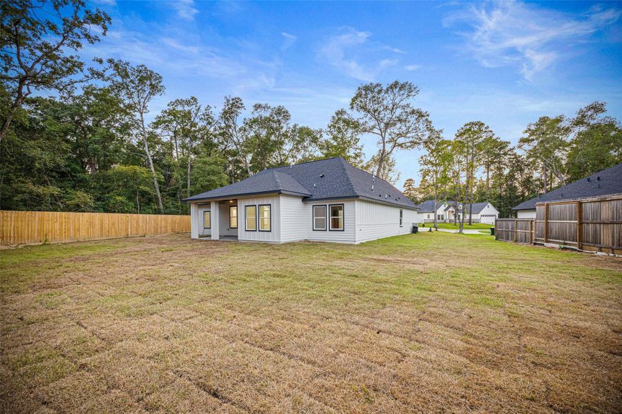 Front exterior of a new home in , Conroe, TX, highlighting curb appeal (Image 16).