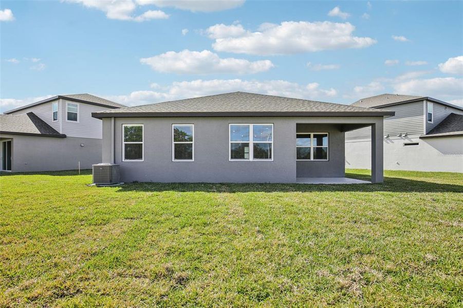 Exterior details and patio area of a home in Magnolia Bay - Reserve Series, Nokomis (Image 3).