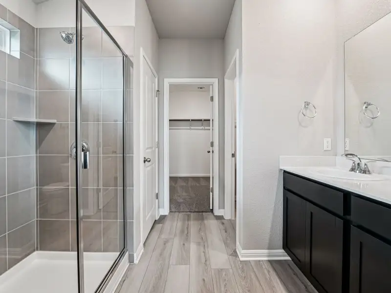 Furnished interior view inside a new home in Riverbend at Double Eagle - Reserve Collection, Cedar Creek (Image 3).