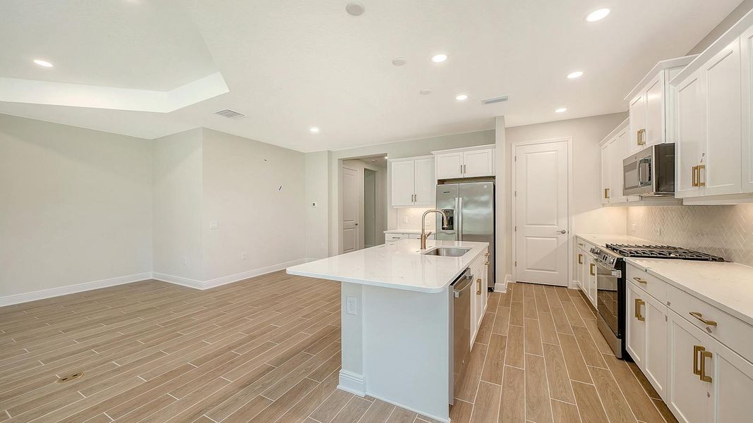 Furnished interior view inside a new home in Grand Park Real Estate and Homes for Sale in Sarasota, FL - Neal Communities, Sarasota (Image 11).
