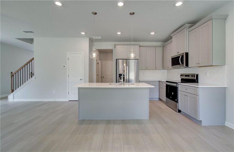 Furnished interior view inside a new home in Enclave at Evergreen, Fairburn (Image 7).