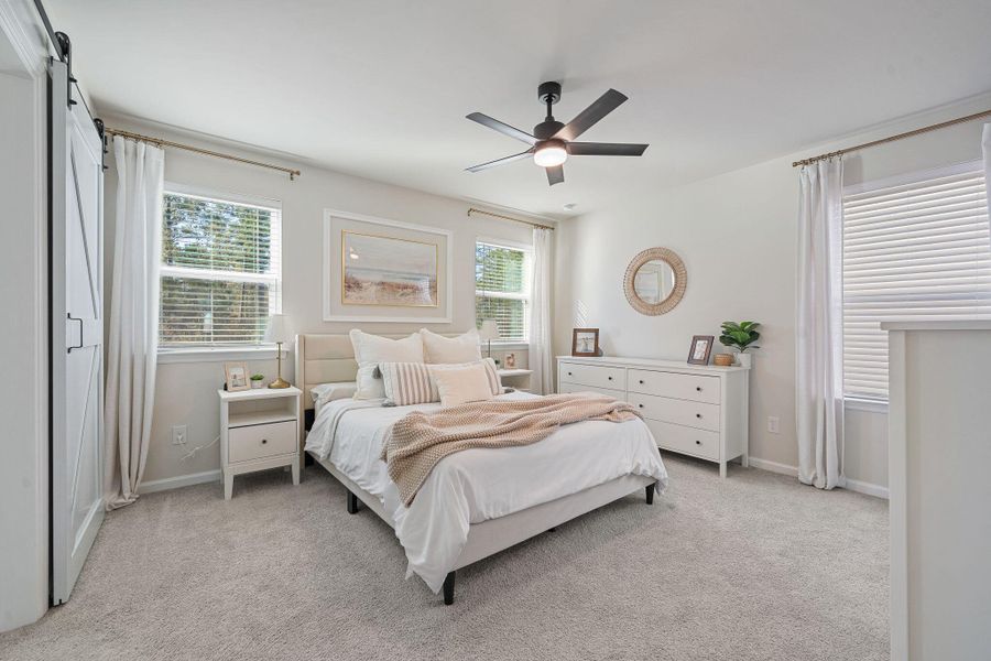 Furnished interior view inside a new home in Jasmine Point at Lakes of Cane Bay, Summerville (Image 11).