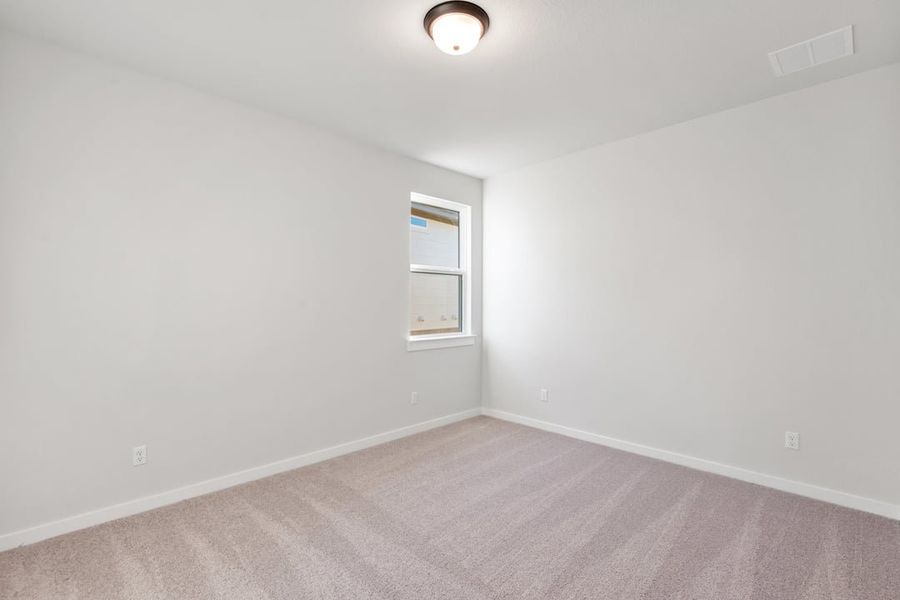 Spacious, unfurnished interior of a new home in Terrace Collection at Lariat, Liberty Hill (Image 45).