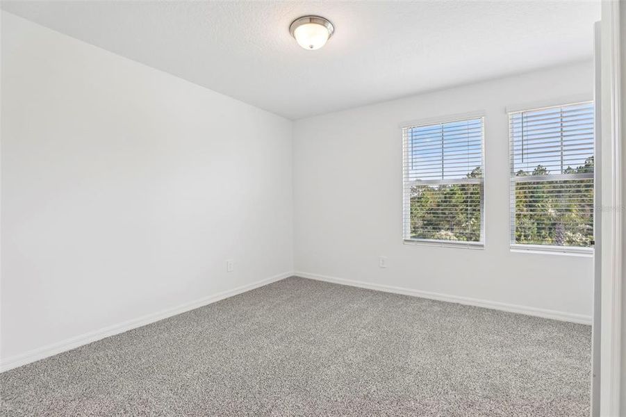 Spacious, unfurnished interior of a new home in The Meadow at Crossprairie Townes, St. Cloud (Image 27).