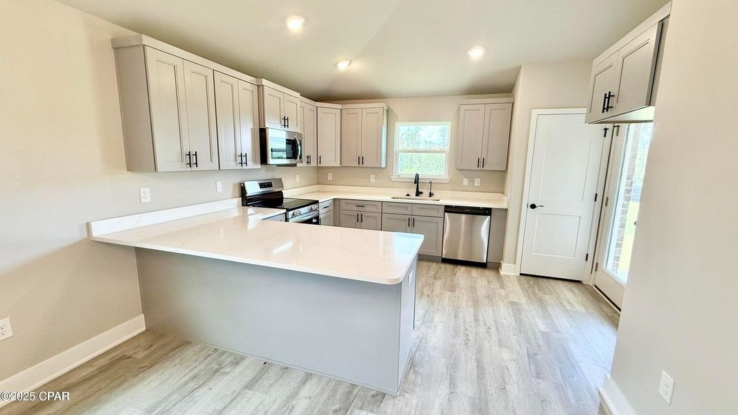 Furnished interior view inside a new home in College Station, Panama City (Image 3).