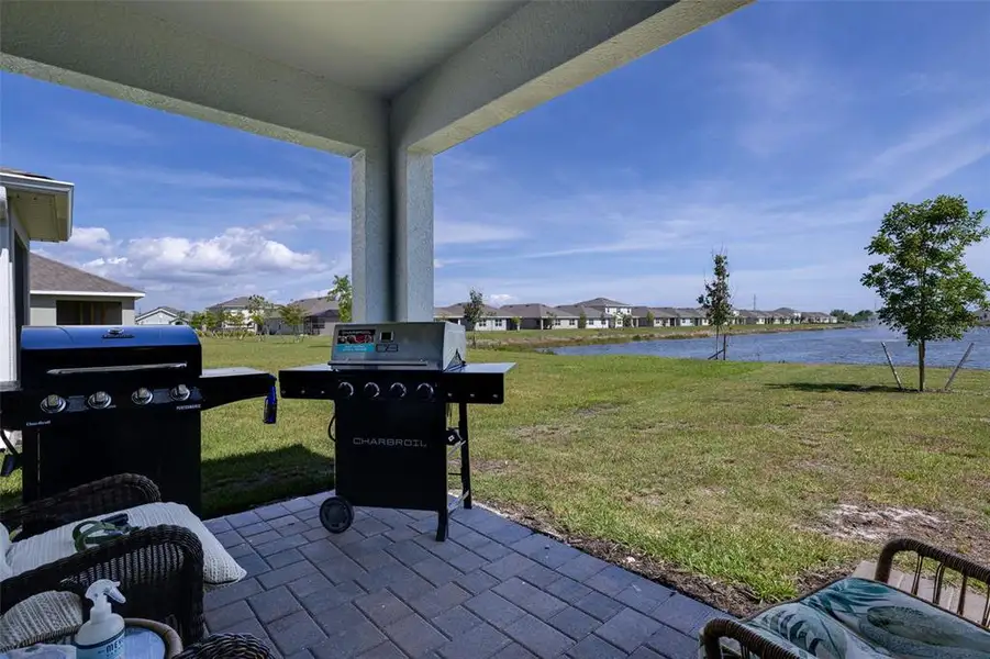 Exterior details and patio area of a home in Coral Bay - Express & Tradition, North Fort Myers (Image 4).