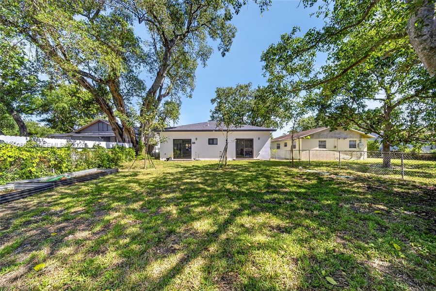 Exterior details and patio area of a home in , Miami (Image 3).