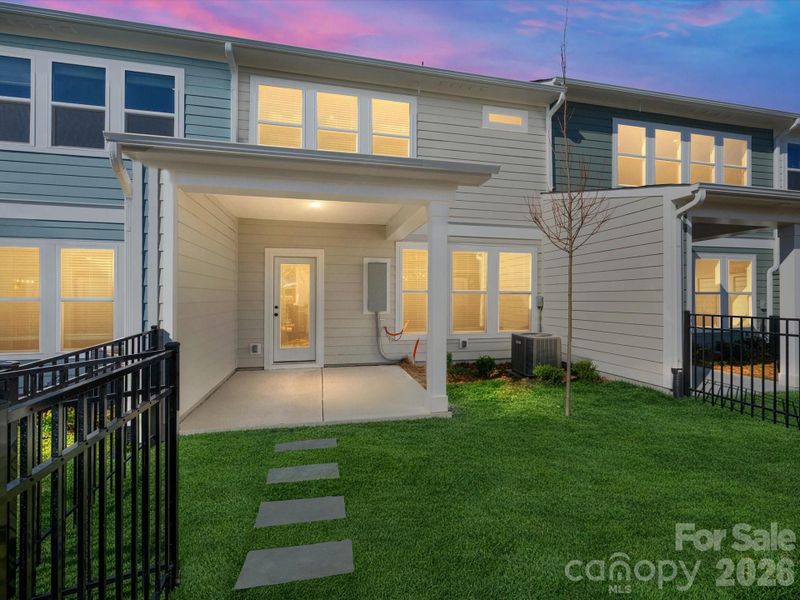 Exterior details and patio area of a home in North Creek Village, Huntersville (Image 4).