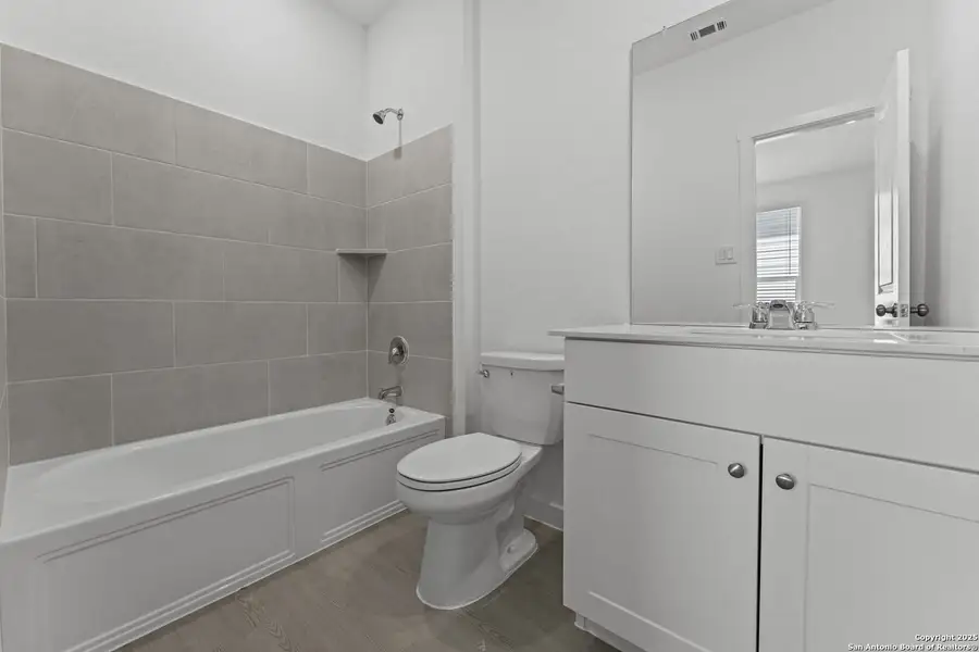 Furnished interior view inside a new home in Waterwheel: Coastline Collection, San Antonio (Image 9).