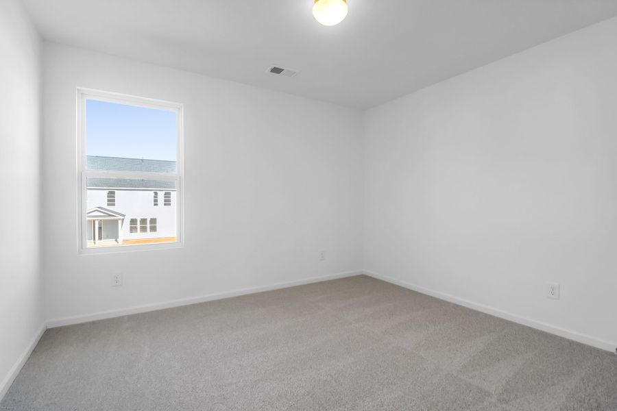 Spacious, unfurnished interior of a new home in Homecoming, Ravenel (Image 22).