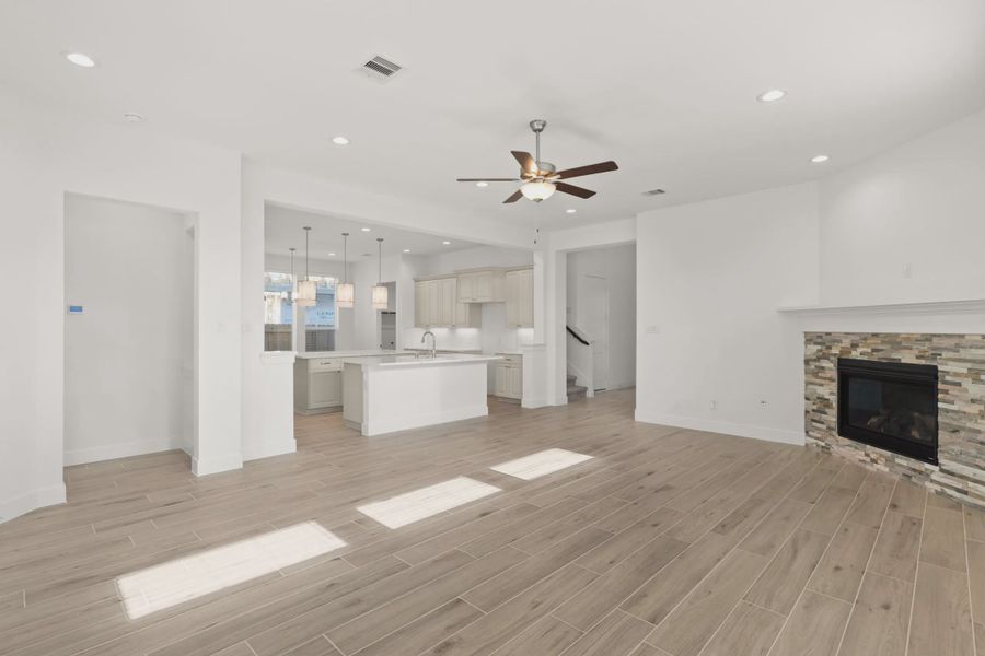 Representative unfurnished interior of a home built from the Macalister by Chesmar Homes in Artavia, Conroe (Image 10).