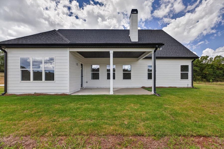Exterior details and patio area of a home in Blackwelder Bluff, Bowdon (Image 4).