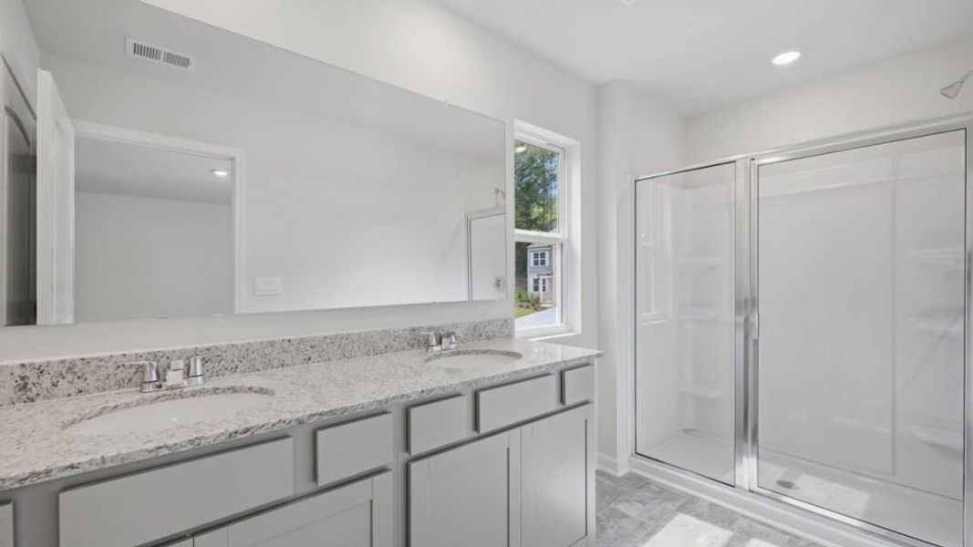 Furnished interior view inside a new home in Oaks at Cedar Grove, Fairburn (Image 10).