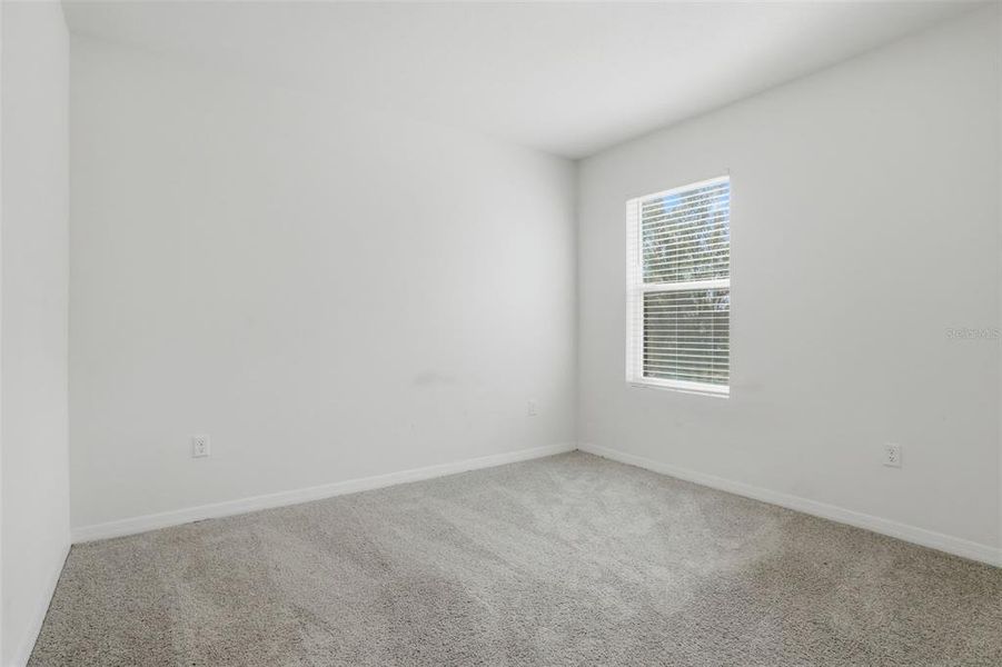Spacious, unfurnished interior of a new home in Poinciana Enclave, Kissimmee (Image 27).