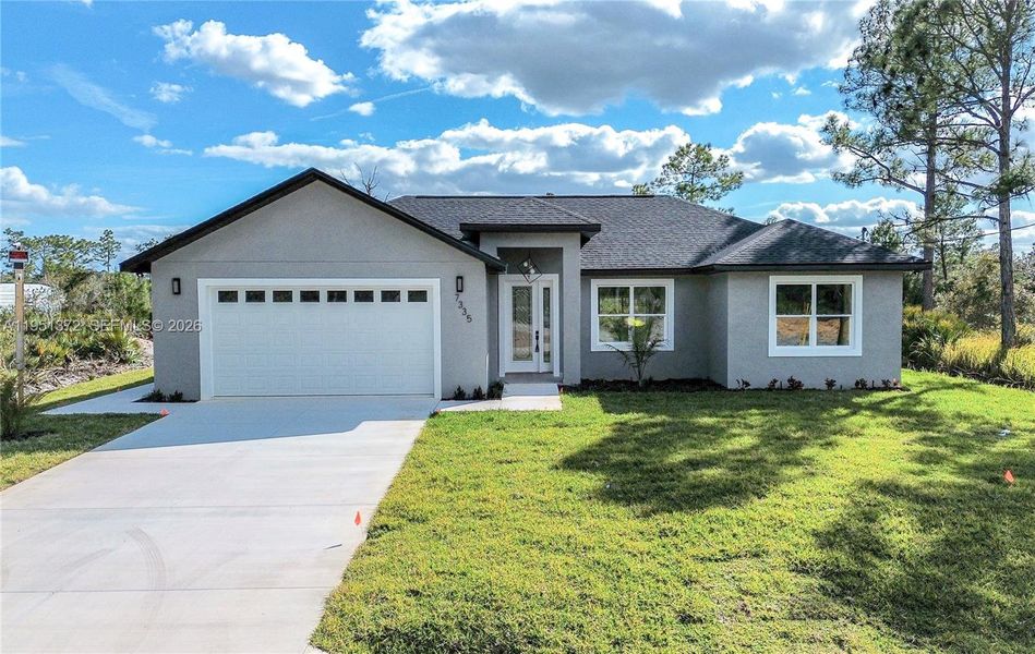 Front exterior of a new home in , Sebring, FL, highlighting curb appeal (Image 22).
