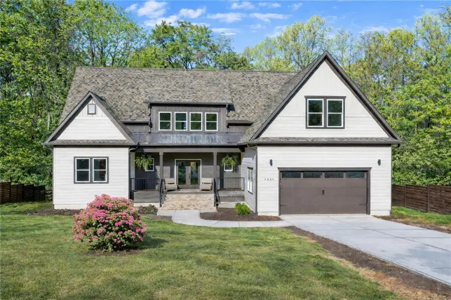 Front exterior of a new home in , Sugar Hill, GA, highlighting curb appeal (Image 1). Front exterior of a new home in , Sugar Hill, GA, highlighting curb appeal (Image 1).