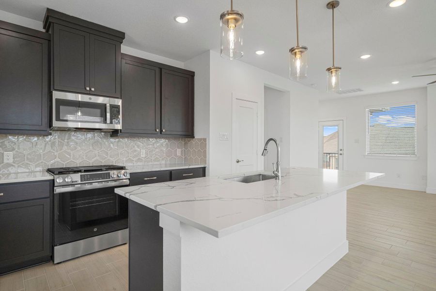 Furnished interior view inside a new home in Bridgeland, Cypress (Image 11). Furnished interior view inside a new home in Bridgeland, Cypress (Image 11).