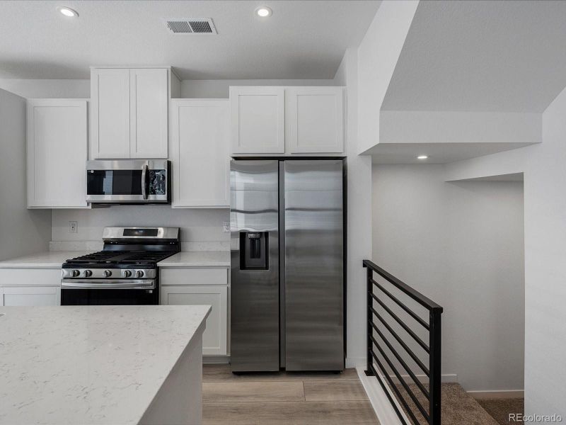 Furnished interior view inside a new home in The Hub at Virginia Village, Denver (Image 8). Furnished interior view inside a new home in The Hub at Virginia Village, Denver (Image 8).