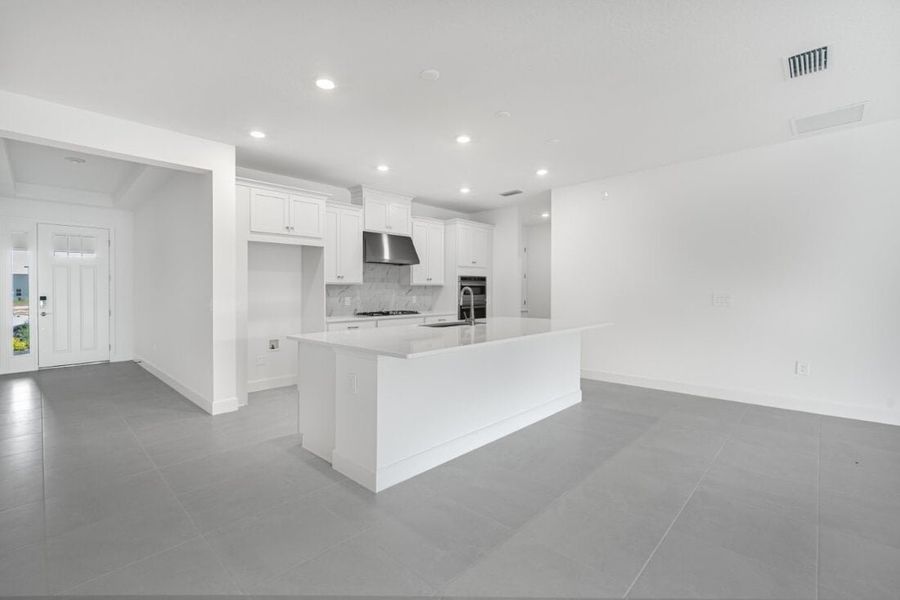 Furnished interior view inside a new home in Harvest at Ovation, Winter Garden (Image 9).