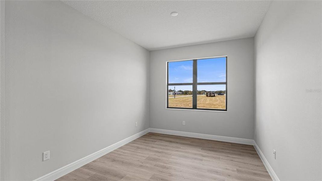 Spacious, unfurnished interior of a new home in Woodland Preserve, Parrish (Image 22).