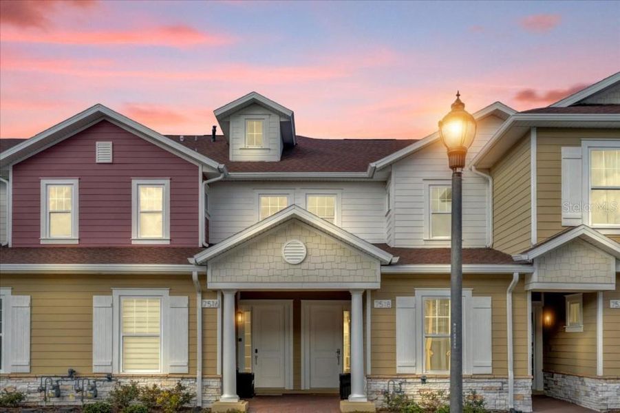 Front exterior of a new home in , Kissimmee, FL, highlighting curb appeal (Image 18).