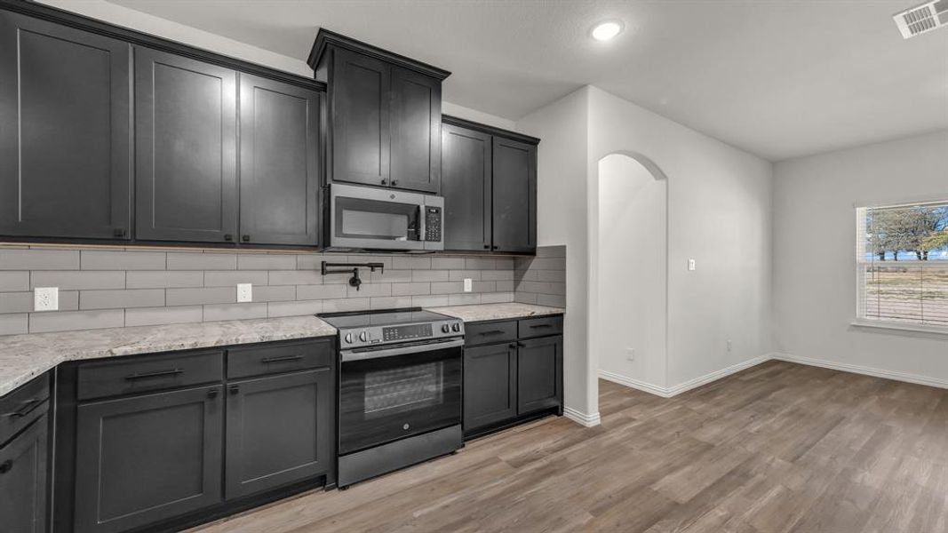 Furnished interior view inside a new home in , Poolville (Image 10).