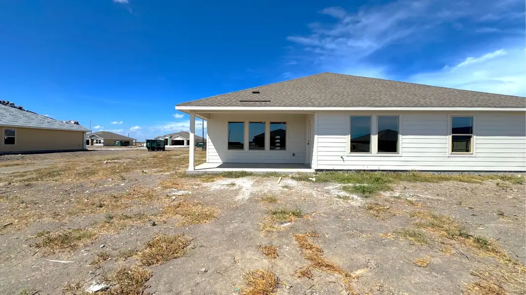 Exterior details and patio area of a home in King's Landing, Corpus Christi (Image 3).