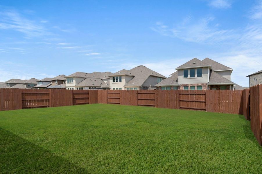 Exterior details and patio area of a home in Oaks at San Gabriel, Georgetown (Image 4).