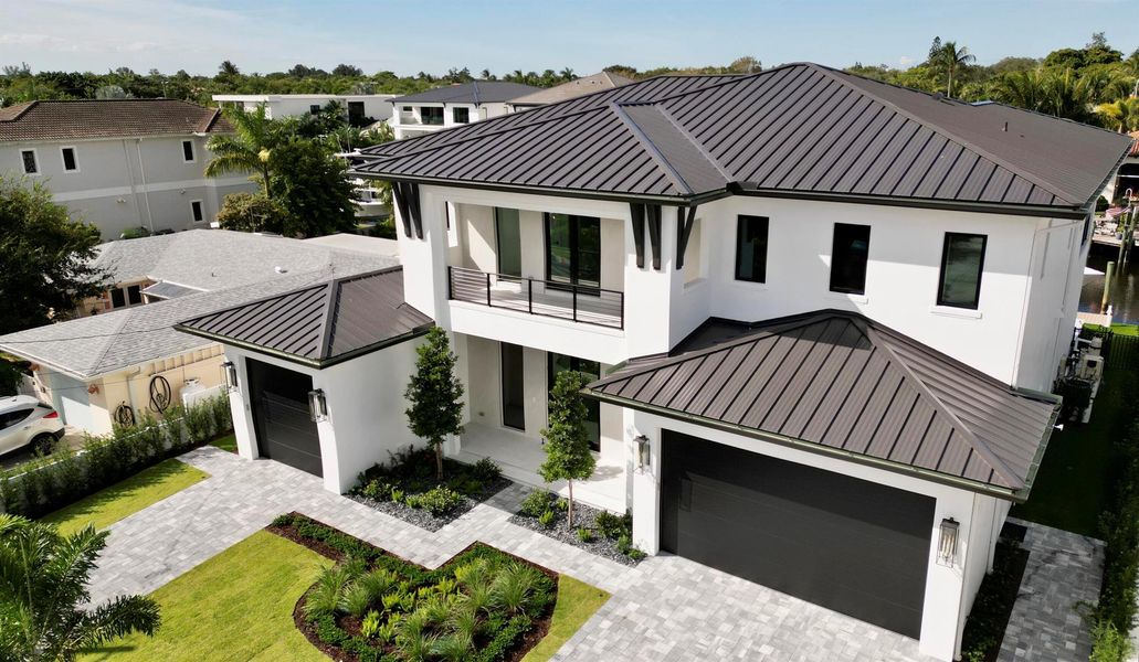 Front exterior of a new home in , Palm Beach Gardens, FL, highlighting curb appeal (Image 30).