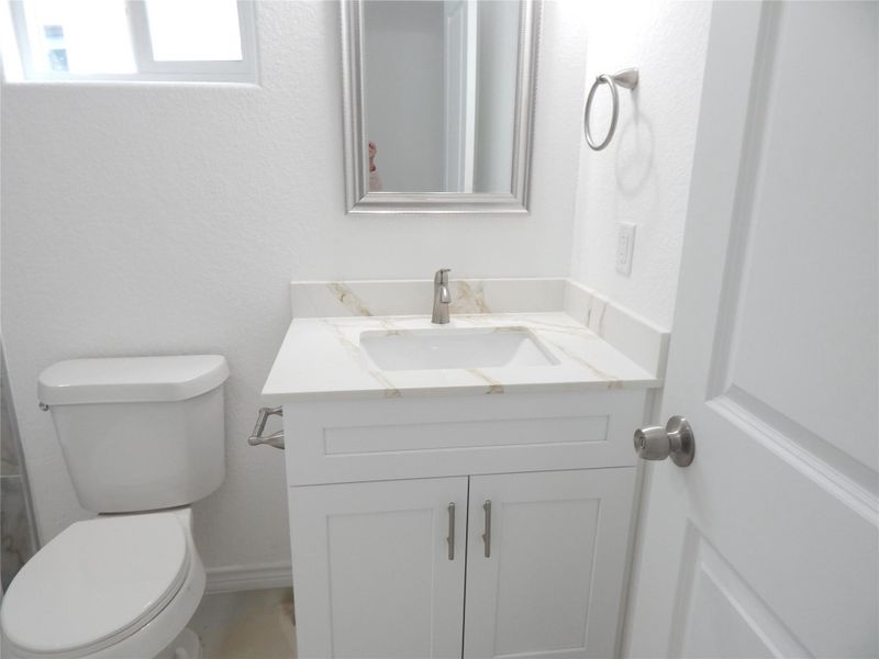 Furnished interior view inside a new home in Bridgeland, Cypress (Image 12).