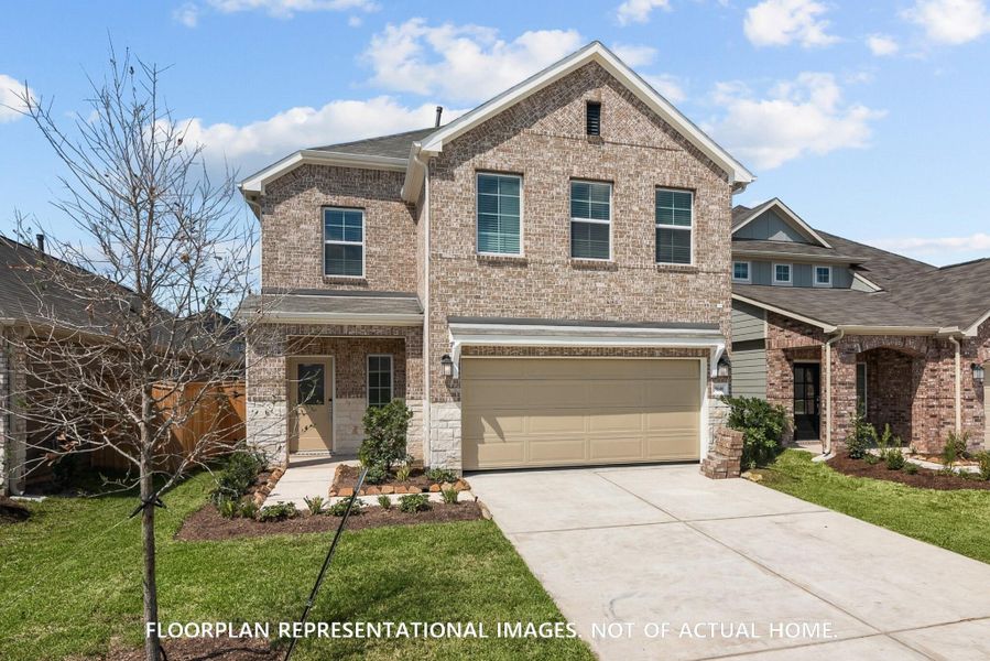 Front exterior of a new home in Moran Ranch, Willis, TX, highlighting curb appeal (Image 1). Front exterior of a new home in Moran Ranch, Willis, TX, highlighting curb appeal (Image 1).