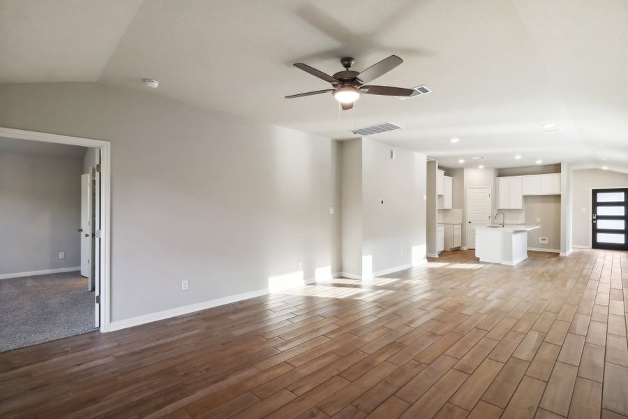 Living room in the Cascade floorplan at a Meritage Homes community.