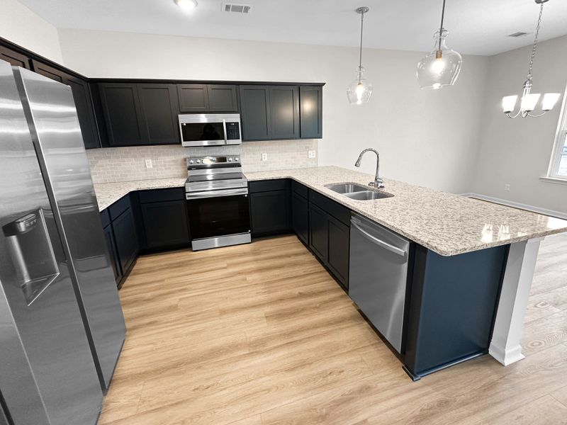 Furnished interior view inside a new home in Grand Reserve, Hinesville (Image 8).