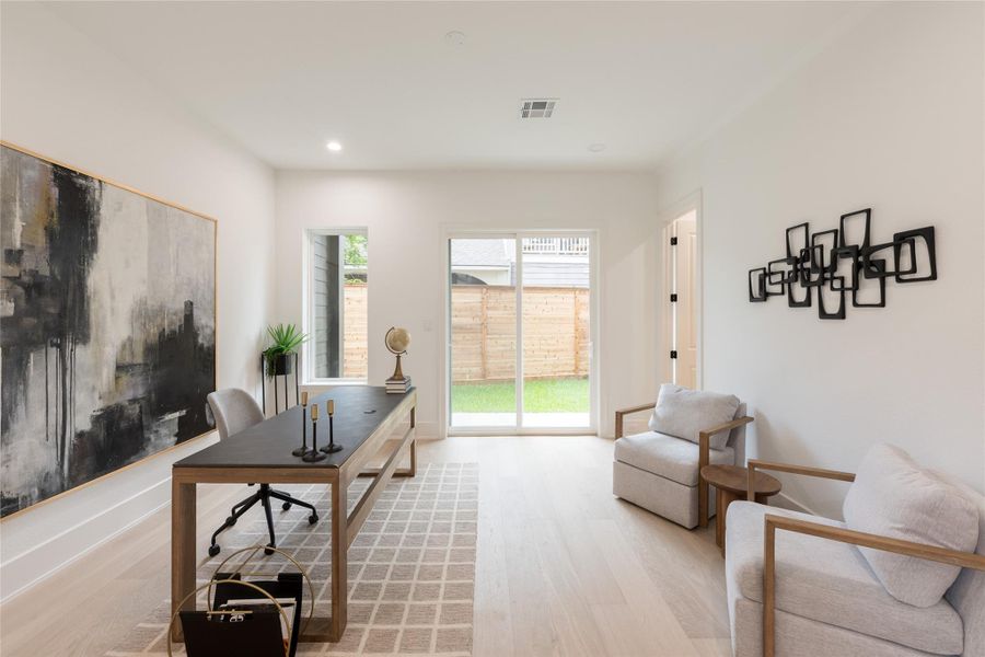 The home office that thinks bigger. Open to the main level, anchored by its own en suite, and set just steps from the yard: a configuration built for long work days, late afternoons with the slider open, and the sort of layout that rewards how people actually live.