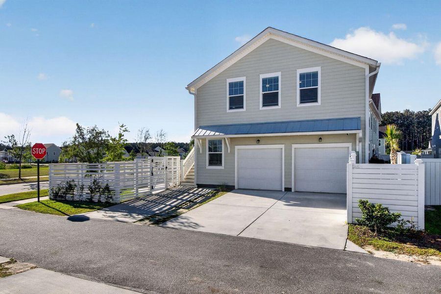 Front exterior of a new home in Nexton, Summerville, SC, highlighting curb appeal (Image 22). Front exterior of a new home in Nexton, Summerville, SC, highlighting curb appeal (Image 22).