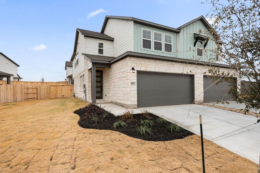 Front exterior of a new home in Park Central, Georgetown, TX, highlighting curb appeal (Image 23).