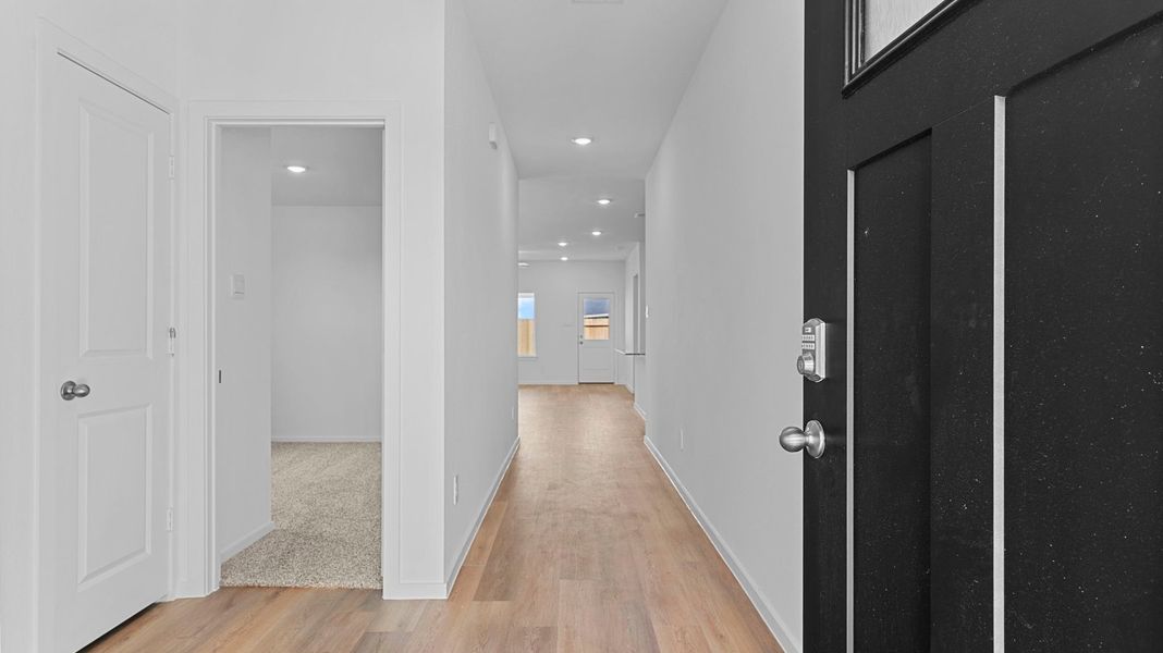 Spacious, unfurnished interior of a new home in Caldwell Crossing, Iowa Colony (Image 10).