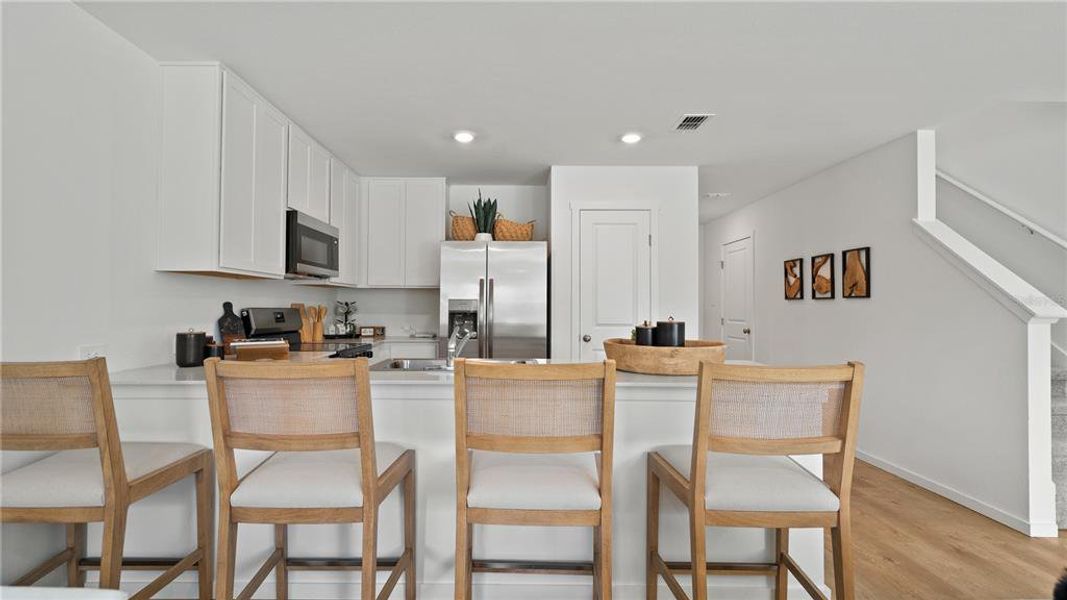Furnished interior view inside a new home in , Davenport (Image 10).