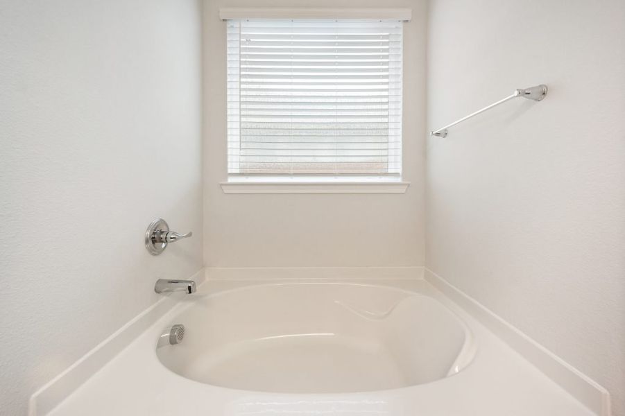 Representative exterior photo of a completed home built from the Harwood by Impression Homes in Heartland, Heartland, TX (Image 21).