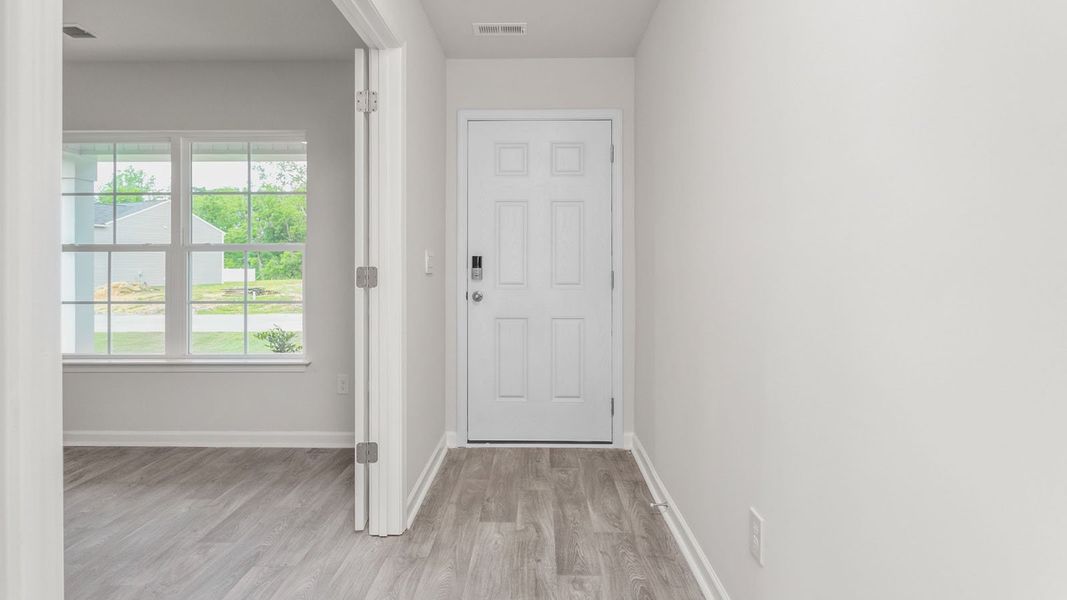 Representative unfurnished interior of a home built from the PENWELL by D.R. Horton in English Farm, Archdale (Image 8).
