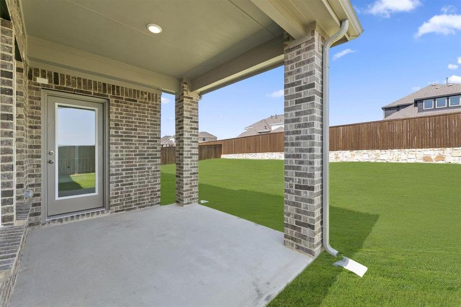Exterior details and patio area of a home in Grayhawk Addition, Forney (Image 3).