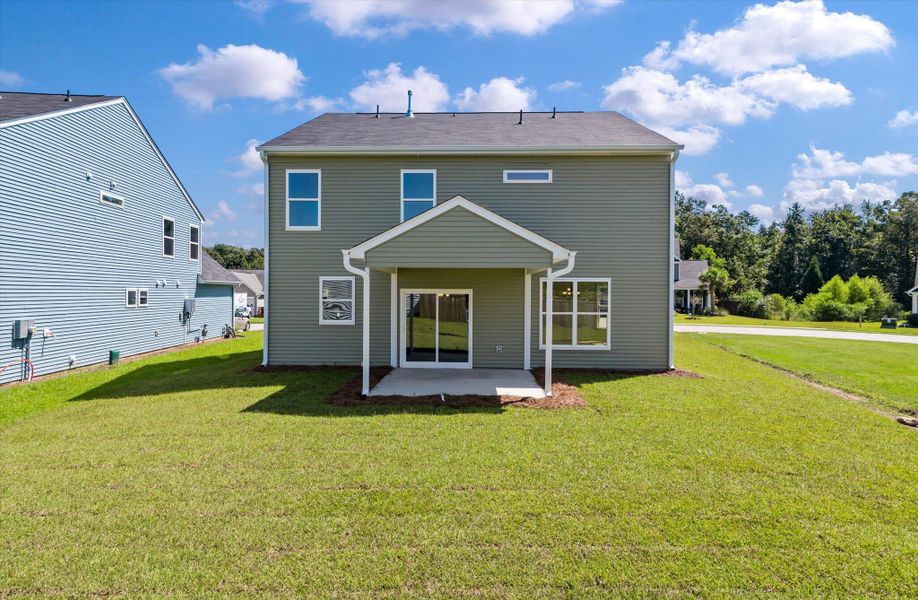 Front exterior of a new home in Oakley Pointe, Moncks Corner, SC, highlighting curb appeal (Image 27).