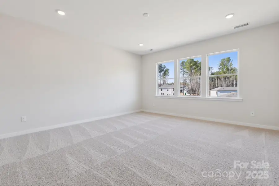 Spacious, unfurnished interior of a new home in Running Creek, Locust (Image 7).