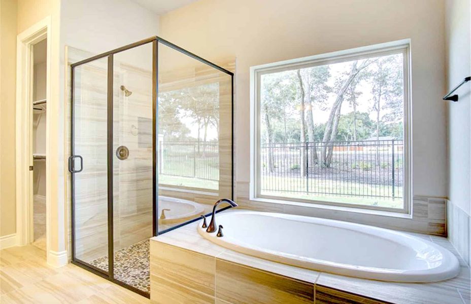 Representative furnished interior of a home built from the 4198 by Ravenna Homes in The Woodlands Hills 65′, Willis (Image 9).